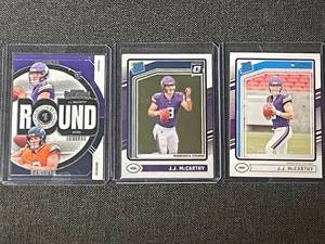 lot 51 image: J.J. McCarthy Rookie Football Card Lot - 2024 Panini & Donruss Optic (3 Cards)
