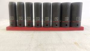 lot 79 image: Set of 7 Impact Socket Wrenches with Organizer Rail