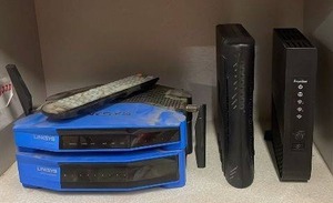 lot 129 image: Lot of 2 Linksys Routers, Arris Modem, Frontier Modem, and Remote