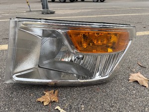 lot 111 image: 09-12 Dodge Ram LH headlight wout quad lights