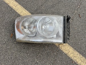 lot 113 image: 07-09 Dodge Ram RH headlight wo lower amber