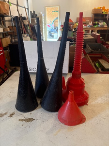 lot 306 image: Five Plastic Automotive Funnels in Black and Red