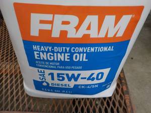 lot 147 image: 2.5 Gallon Fram Engine Oil...