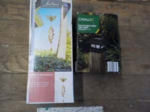 lot 208 image: Hanging Wind Spinner and Solar Deck...