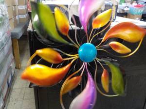 lot 211 image: Kinetic Wind Spinner...