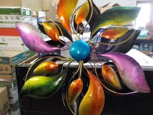 lot 212 image: Kinetic Wind Spinner - repaired...