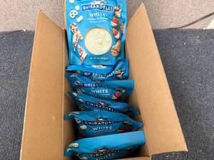 lot 132 image: 6 Bags of Ghiradelli White Melting Chocolate