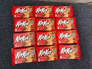 lot 203 image: 12 Kit Kat Chocolate Donut Flavored