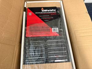 lot 49 image: 8 Adjustable 19 Cooking Grates