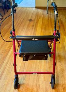 lot 87 image: Foldable Walker with Padded Seat and Cupholder