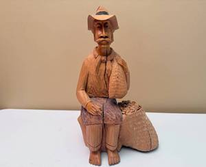 lot 17 image: Vintage Coffee Bean Farmer with Cigarette Folk Art