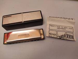 lot 209 image: Hohner Harmonica & Case