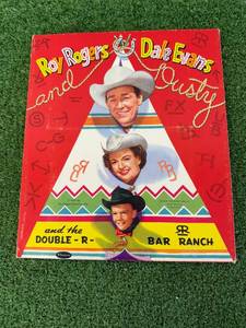 lot 2 image: 1957 Roy Rogers, Dale Evans & Rusty Paper Dolls