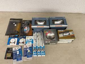 lot 92 image: Exhaust Clamps, Tail Pipe Hangers, Headlamps & Battery Items