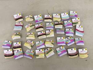 lot 52 image: Hair Coils (37 packs)