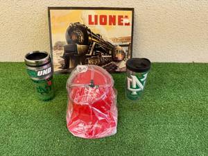 lot 130 image: New Drinking Helmet, UND Cups & Lionel Metal Sign