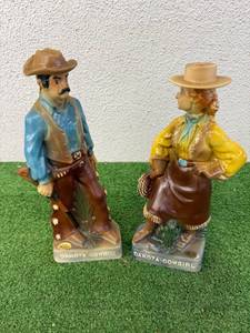 lot 168 image: Dakota Cowboy & Dakota Cowgirl Decanters