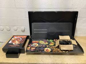 lot 409 image: Blackstone 36 Omnivore Griddle with Hood , Plate,and Side Shelf (Missing Body)
