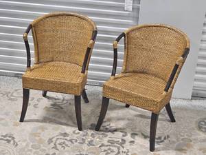 lot 26 image: Rattan Barrel Accent Chairs from Pier One