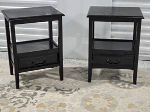 lot 15 image: Chic Black Accent Table Pair