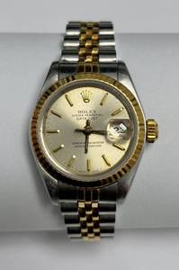 lot 1 image: Rolex Ladys Datejust 6917  18K Fluted Bezel, Silver Dial, 26mm