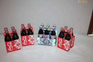 lot 16 image: Collection of 4 Coca-Cola Holiday Bottles 6-Packs Including 2007 Diet Coke Limited Edition