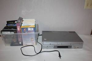 lot 30 image: Sony DVD VHS Combo Player with Storage Bin of Movies and Games