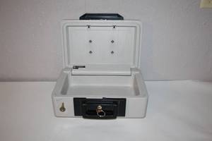 lot 57 image: Sentry 1100 Fire-Safe Security Box with Key