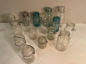 lot 105 image: Collection of 15 Vintage Glass Canning Jars Wire Top Varieties