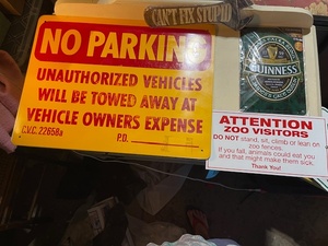 lot 114 image: Collection of 4 Metal Signs Including No Parking, Zoo Warning, Guinness, and Cant Fix Stupid Signs