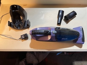 lot 126 image: Shark Cordless Handheld Vacuum with Charging Base and Attachments