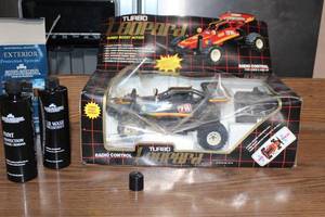 lot 163 image: Turbo Leopard Radio Control Car in Original Box with Auto Armor Products