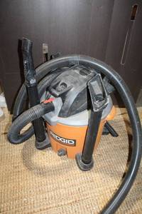 lot 173 image: RIDGID Wet Dry Shop Vacuum with Hose and Attachments