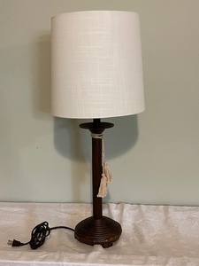 lot 21 image: Table Lamp with White Shade and Decorative Tassel Accent