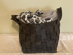 lot 23 image: Woven Felt Storage Basket with 2 Throw Blankets