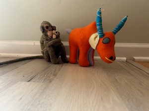 lot 67 image: Pair of Handmade Wool Animal Figures - Monkey with Baby and Orange Antelope