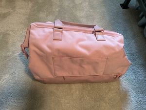 lot 108 image: Large Pink Travel Duffle Bag with Side Pocket