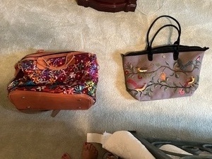 lot 110 image: Set of 2 Embroidered Travel Bags with Floral and Bird Designs