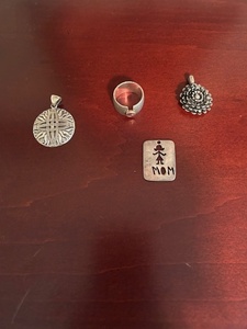 lot 125 image: Collection of 4 Silver Jewelry Pieces - Pendants and Ring