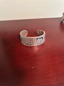 Pair of Sterling Silver Cuff Bracelets with Etched and Gemstone Designs