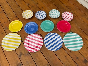 lot 147 image: Set of 12 Colorful Polka Dot and Stripe Ceramic Plates and Bowls