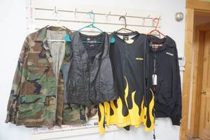 lot 136 image: Leather Vest, Ski Doo Shirt New With Tags, Camo Jacket, Heated Jacket