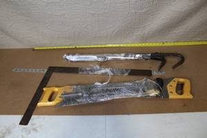 lot 3 image: Collection of Hand Tools Including Saws, Crowbars, and Square
