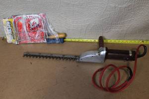 lot 4 image: Sunbeam Model A-1-A Electric Hedge Trimmer and Coping Saw Set
