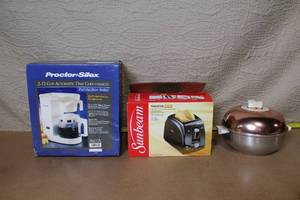 lot 11 image: Proctor-Silex Drip Coffeemaker, Sunbeam Toaster Model 3910, and Metal Roasting Pan