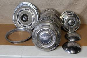 lot 15 image: Collection of Vintage Metal Hubcaps and Wheel Covers Assorted Styles