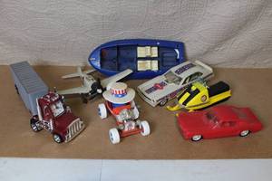 lot 23 image: Collection of 6 Vintage Toy Vehicles - Cars, Truck, Plane, Boat, Snowmobile