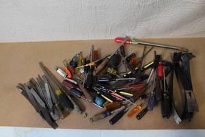 lot 25 image: Box Lot of Mixed Hand Tools Including Screwdrivers, Files, Pry Bars, and Saw