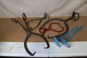 lot 35 image: Collection of Vintage Ice Tongs and Blue Hay Bale Hooks