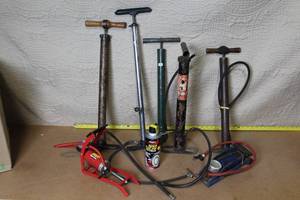 lot 38 image: Lot of 5 Vintage and Modern Tire Pumps with Quick Flat Fix Can